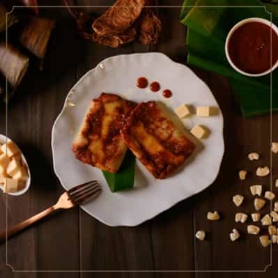 LoRes - Tamal - Flor de Lis - Oaxaqueño - Salsa de chipotle con queso - Hoja de plátano